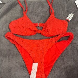 DIPPIN DAISYS Red Eyelet Reversible Bikini Set TOP-SIZE M BOTTOM-SIZE L NWT